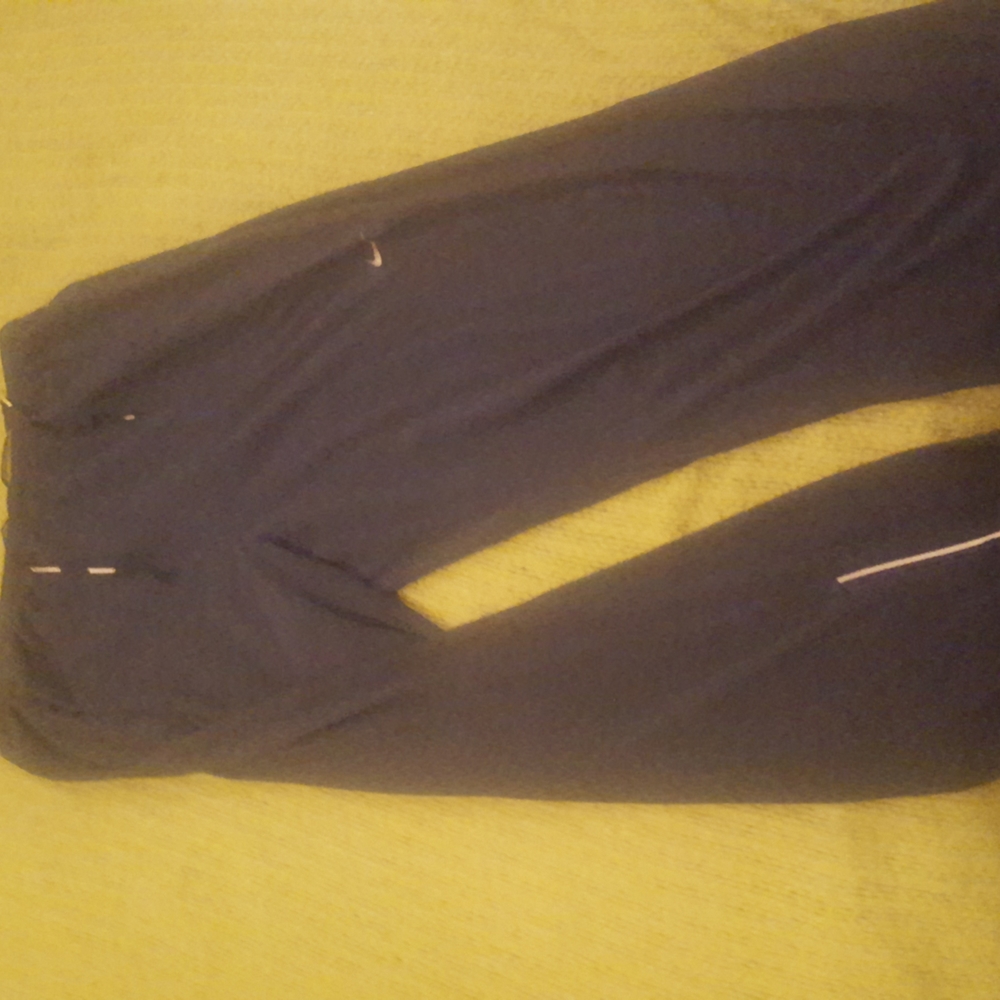 Blue Nike dri fit running pants